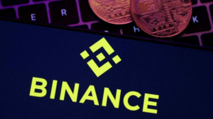 FILE PHOTO: Smartphone with displayed Binance logo and representation of cryptocurrencies are placed on keyboard in this illustration taken, November 8, 2022. REUTERS/Dado Ruvic/Illustration/File Photo