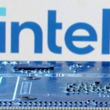 FILE PHOTO: Intel logo is seen near computer motherboard in this illustration taken January 8, 2024. REUTERS/Dado Ruvic/File Photo