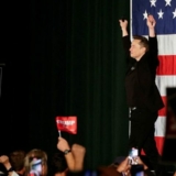 Tesla CEO and X owner Elon Musk, who supports Republican presidential nominee former U.S. President Donald Trump, gestures during an America PAC Town Hall in Folsom, Pennsylvania, U.S., October 17, 2024. REUTERS/Rachel Wisniewski