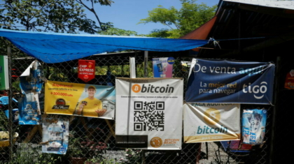 FILE PHOTO: Bitcoin banners are seen outside of a small restaurant at El Zonte Beach in Chiltiupan, El Salvador June 8, 2021. REUTERS/Jose Cabezas/File Photo