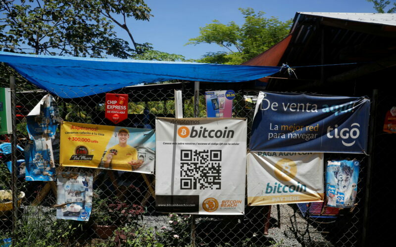 FILE PHOTO: Bitcoin banners are seen outside of a small restaurant at El Zonte Beach in Chiltiupan, El Salvador June 8, 2021. REUTERS/Jose Cabezas/File Photo