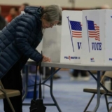 BEDFORD, NEW HAMPSHIRE - JANUARY 23: A voter fills out their ballot at a polling location at Bedford High School on January 23, 2024 in Bedford, New Hampshire. Voters headed to the polls as New Hampshire holds its primary. (Photo by Joe Raedle/Getty Images)