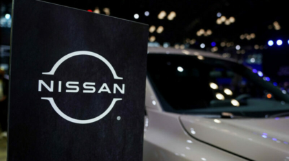 FILE PHOTO: A Nissan logo is seen next to a vehicle during the New York International Auto Show, in Manhattan, New York City, U.S., April 5, 2023. REUTERS/David 'Dee' Delgado